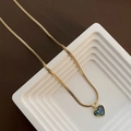 Gouden hartketting met abalone schelp inleg op een slanke platte slangenketting - Abalone Schelp Hart Ketting