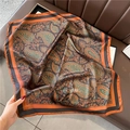 Caramel paisley silk scarf with vintage twill pattern draped on a leather base - Vintage Caramel Paisley Style (FJX9-1)