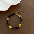 Collana di perle vintage con agata nera, pietre gialle e chiusura dorata regolabile - Bracciale di Perline in Acciaio al Titanio (04-H10)