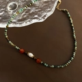 Vintage turquoise beaded necklace with red agate accents and a white pearl on leather - Titanium Steel Turquoise Pearl Beaded Necklace (02-H12)