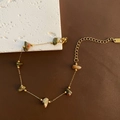 Elegante bracciale in titanio dorato con pietre naturali e catena di estensione - Bracciale in Pietra (Oro) / Oro