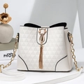 White bucket bag with geometric texture, cat pendant, and chain strap - Off White