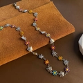 Collier marguerite et papillon en acier titane avec breloques émaillées multicolores - Collier