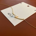 Elegant gold titanium steel necklace featuring a lustrous white pearl and metal bar - Gold Necklace