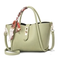 Light green textured leather bucket bag with silk scarf handle and gold lock - Green