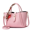 Pink lychee texture handbag with gold twist lock and a decorative floral silk scarf - Pink