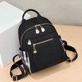 Stylish black nylon backpack with elegant red and white checkered side pockets for women - Colored Grid