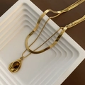 Double layered gold necklace featuring a sleek snake chain and tiger eye stone pendant - Gold Tiger Eye Double Layer Necklace