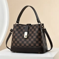 Brown and black checkered pattern bucket bag with top handle and gold clasp closure - Coffee Plaid