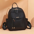 Zaino classico in tessuto oxford nero con hardware dorato e tasche portaoggetti - Nero