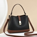 Litchi pattern bucket bag in black and brown bicolor leather with golden hardware - Black