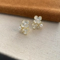 Elegant gold flower stud earrings with white petals and pearls on textured fabric - Camellia Stud Earrings (1-6#4)