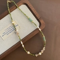 Vintage green stone and pearl necklace displayed on a rustic linen jewelry tray - Olive Green Style (06-M 10)