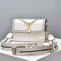 Cream rectangular crossbody bag with gold chain and lettered strap on display - Off White