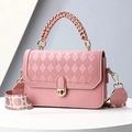 Pink quilted handbag for women with chain handle and embroidered strap on geometric base - Pink