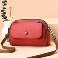 Mini crossbody phone bag for women in red leather with brown straps and three zippers - Burgundy