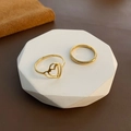 Minimalistische tweedelige gouden titanium stalen ringenset met hol hart ontwerp - US 7 / Hart En Eenvoudige Ring (Goud)