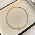 Gouden platte schakelketting met een witte vlinderhanger van parelmoer - Titanium Stalen Vlinder Ketting