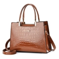 Elegante dunkelbraune Handtasche mit Krokodilmuster, Doppelgriffen und Umhängegurt - Erdgelb