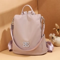 Chic anti-theft women backpack in soft pink waterproof nylon with metallic logo - Flat Metal Buckle - Pink Purple