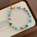 Pulsera de piedras naturales de colores con cristales multicolores y cierre dorado - Pulsera de Acero de Titanio Aguamarina