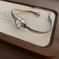 Halskette aus Titanstahl mit hohlem Herz und silberner flacher Gliederkette für Damen - Armband / Silber