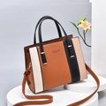 Contrast color handbag in caramel, beige and black with top handles and shoulder strap - Brown