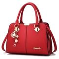 Red lychee pattern leather tote bag for women featuring floral pearl bag charm - Burgundy