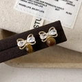 Elegant gold bow earrings with clear zircons and brown tiger eye stone beads - Gold Bowknot Tiger Eye Stud Earrings