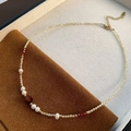 Baroque pearl necklace with purple amethyst and gold sun beads on velvet bag - Dark Red Faceted Bead and Natural Pearl Style (05-F28)