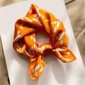 Elegant orange silk-like scarf with minimalist white geometric letters and numbers print - Orange Geometric Letter Style (FX-286)