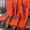 Detail of red silk scarf with phoenix and clouds pattern on a dark leather texture - Phoenix Auspicious Cloud Red (XL113-1)