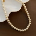 Collier élégant à une rangée de perles crème avec fermoir doré et chaîne réglable - Blanc Cassé (Grand)