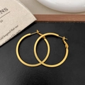 Detail of gold geometric hoop earrings with flat square edges on a premium display - Gold 2cm x 40mm