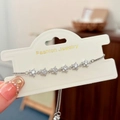 Detalle de la pulsera de estrella plateada con circonitas y cadena ajustable - Plateado