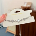 Detail of adjustable silver clover bracelet with white shell inlays and pavé zircons - Four Leaf Flower (Silver) / Silver