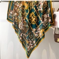 Detail of teal silk scarf with white magnolia flowers and yellow borders hanging naturally - Deep Teal White Magnolia (FE109-3)