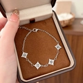 Bracciale a catena in argento con quattro ciondoli a rombo tempestati di zirconi - Argento Zirconia Trasparente