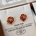 Macro detail of retro red enamel rose studs on a white card with premium gold finish - Small Vintage Red Rose Style (A-840)