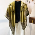 Detail of luxury green and gold silk shawl featuring vintage floral patterns on a hanger - Green Gold Monogram Shawl Style (FE128-1)