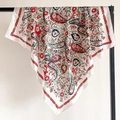 Detail of bohemian paisley silk scarf showing flowing satin texture and intricate floral print - White Red Heart Paisley (FT248-1)