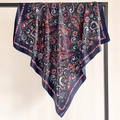 Close-up of a navy blue silk scarf with red paisley patterns hanging on a black hanger - Dark Blue Paisley Floral (FT248-5)