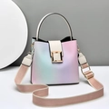 Fashionable gradient bucket bag with wide strap and gold hardware on white surface - White