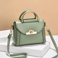 Bohnengrüne Lederhandtasche mit goldenem Rundmetallgriff und abnehmbarem Schultergurt - Grün
