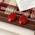 Elegant Ankara red enamel stud earrings featuring an irregular pebble shape on velvet - China Red Irregular Smooth Pebble Style (A-1662)