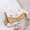 Chic Eiffel Tower print crossbody bag with cat-ear pearl buckle and wide shoulder strap - Yellow
