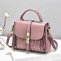 Dusty pink faux leather crossbody bag with V-shaped quilting and gold metal lock - Purple