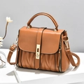 Caramel brown small square handbag with V-shaped quilting and gold metal buckle - Earthy Yellow