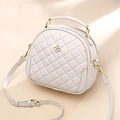 Quilted beige round crossbody bag with gold clover logo and adjustable shoulder strap - Off White