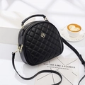 Quilted round crossbody bag in black leather with gold clover hardware and chain strap - Black